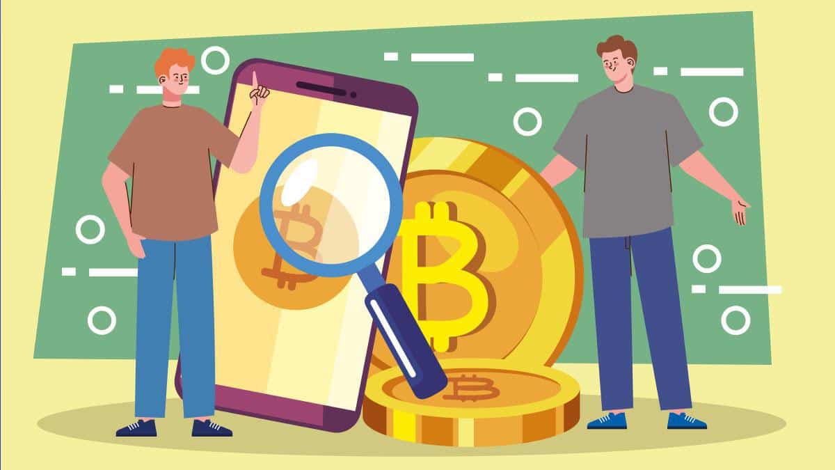 Two animated people with bitcoin coins and a big smartphone