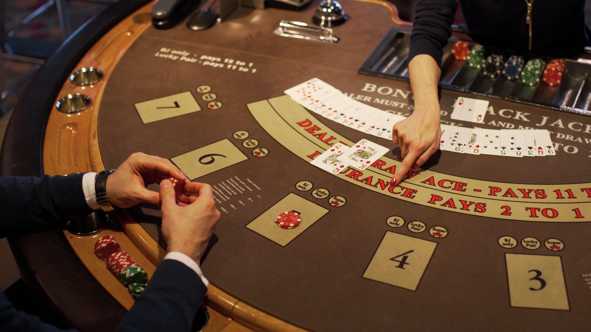 Image of a blackjack table where a hand is live