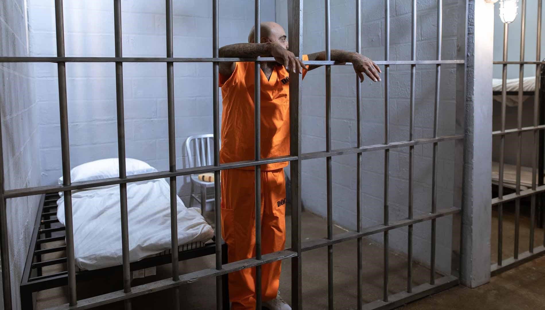 An image of a prisoner wearing orange prison clothes