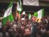 Image of people holding Nigerian flags
